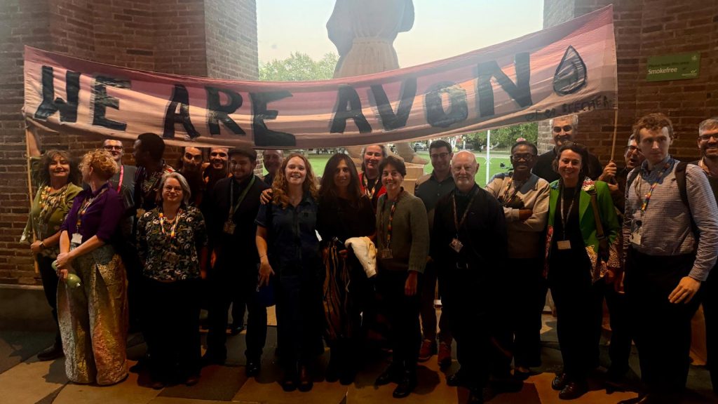 A photograph of Green Councillors and campaigners celebrating after the river's rights were formally recognised at Full council. 